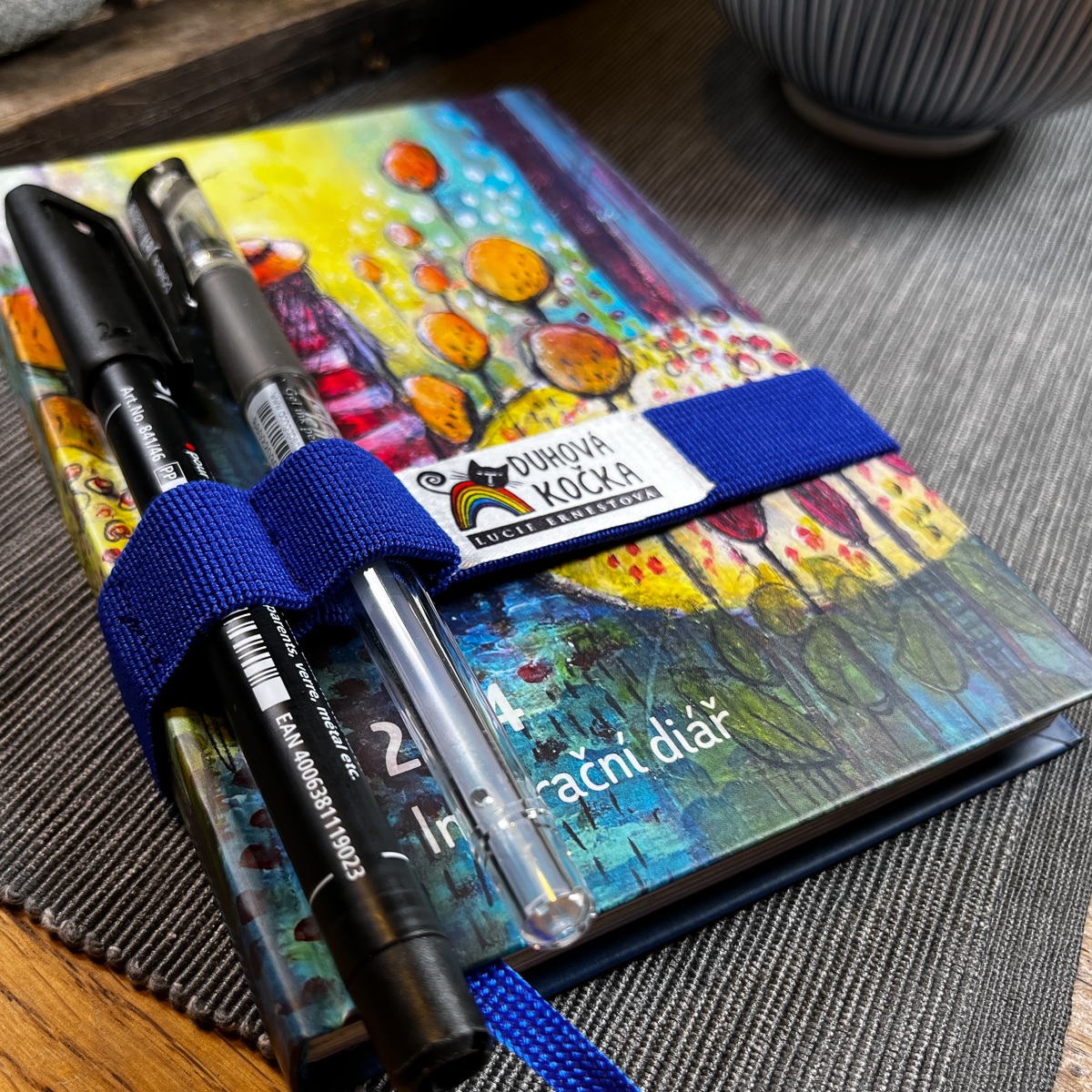 Duhová kočka Gumička na minidiář  Modrá